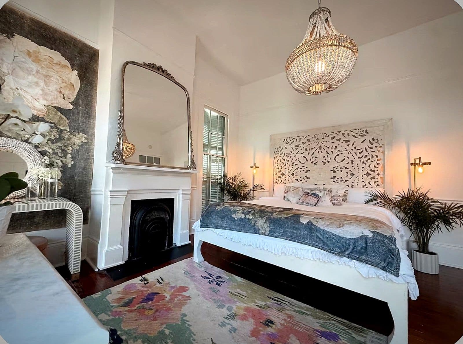 The Esplanade Suite, with its antique mirror and fireplace