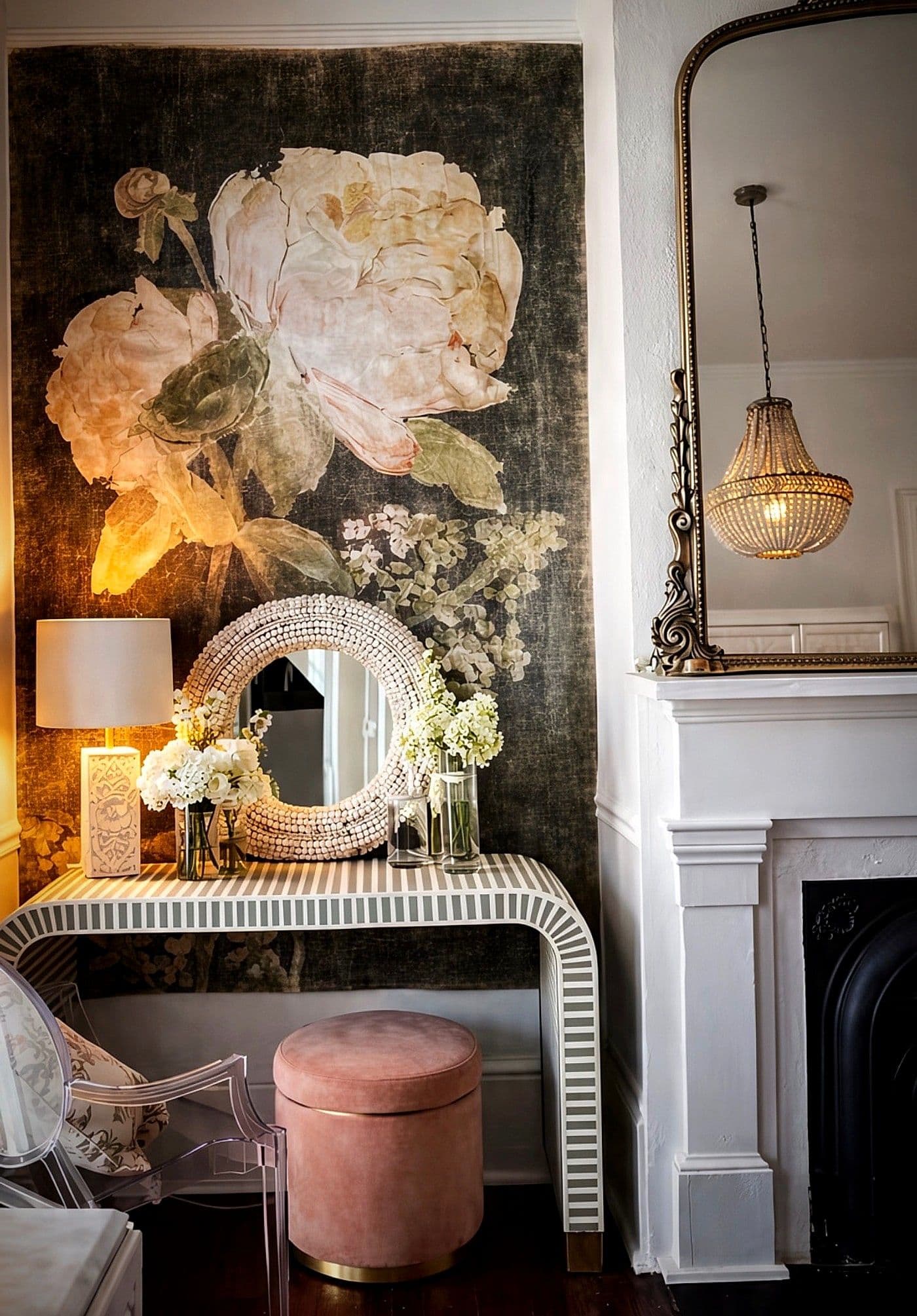 A hand-painted floral mural above the console table in the parlor